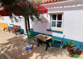 Casa Anneli - relaxing under the olive tree